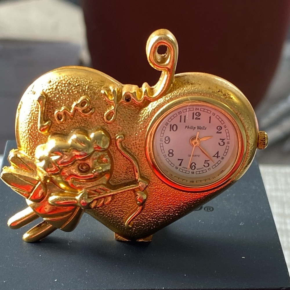 Miniature philip wells clock